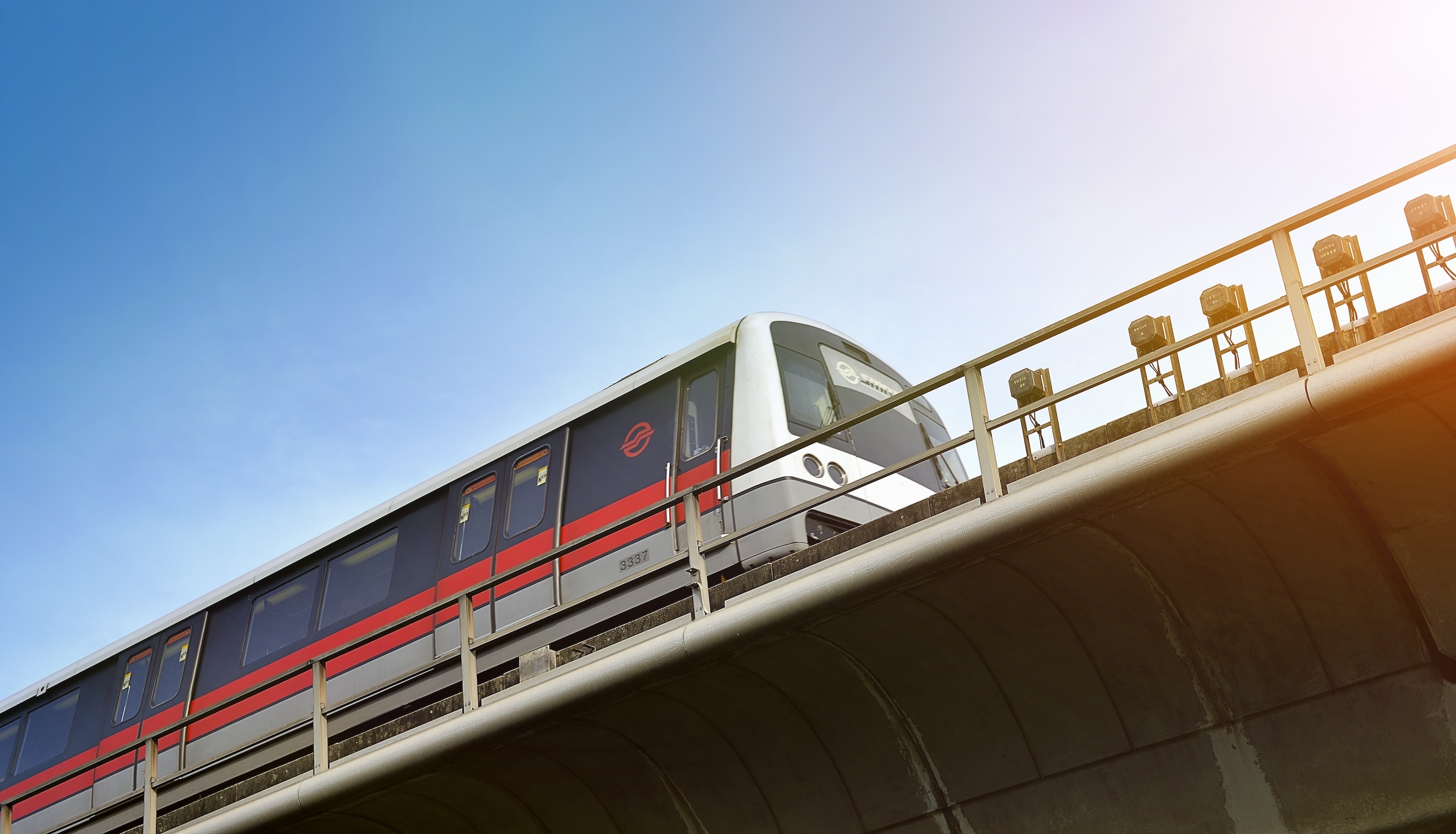 SINGAPORE - OCTOBER 15, 2017: Singapore mass rapid train (MRT) travels on the track. The MRT has 106 stations and is the second-oldest metro system in Southeast Asia.