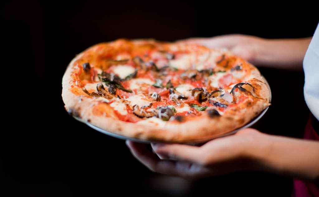 Thin crust pizza in Marina Bay from the OverEasy folks