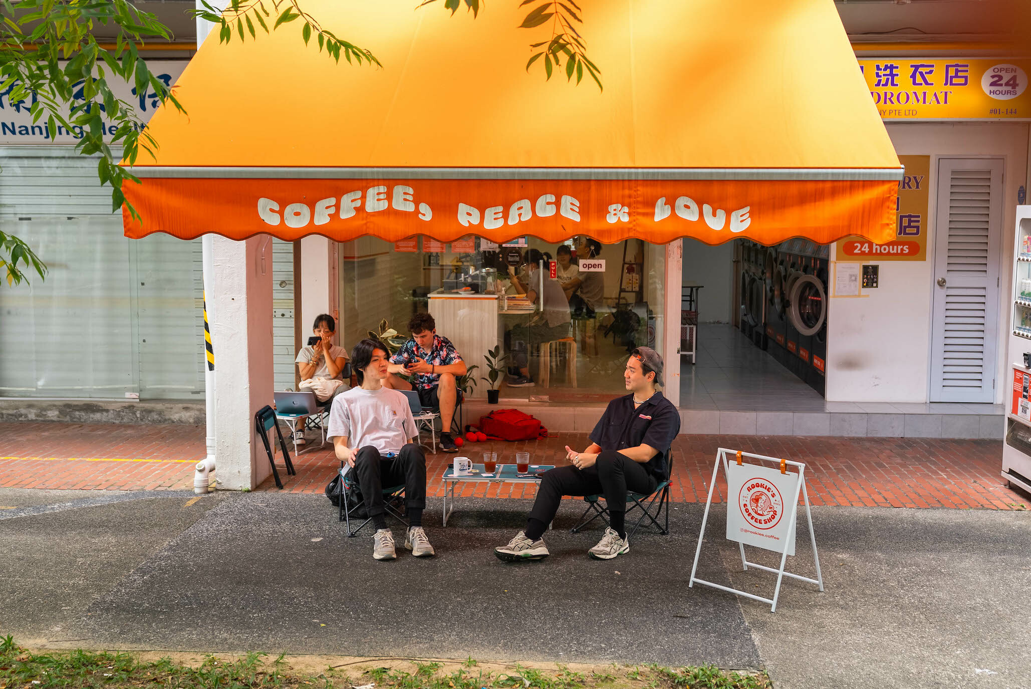 Coffee and Conversations outside of Rookie's Coffee Shop