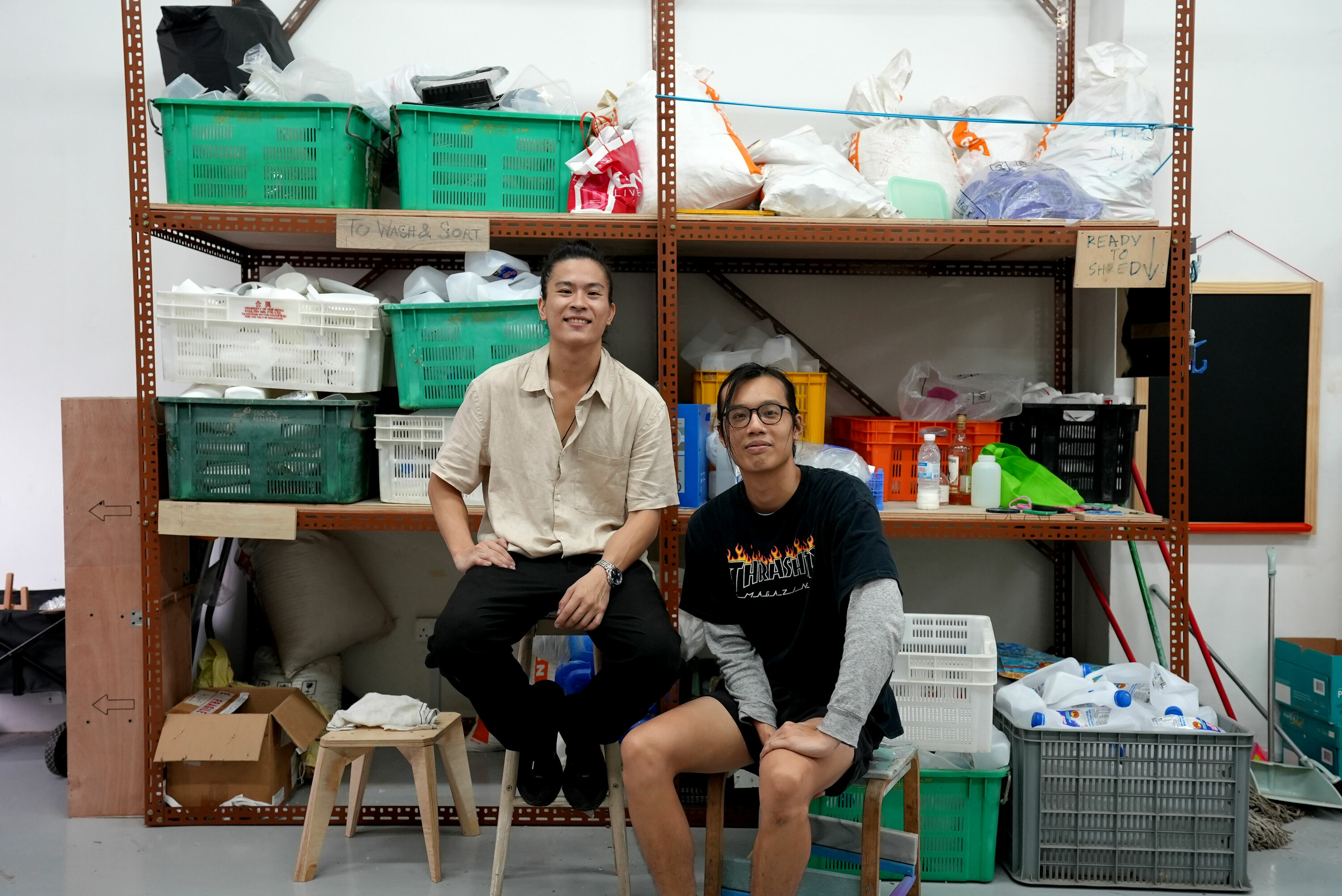 Paul Lee, director of Plastify (left) and Davniel Tan, regular volunteer at Plastify (right)