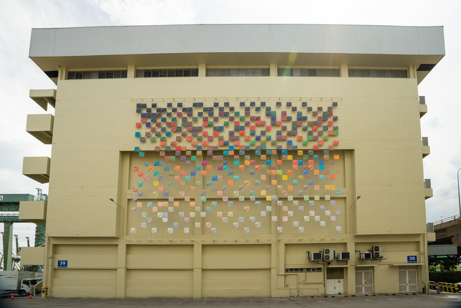 Grace Tan's 'Sea of Flags' (2023), as part of ‘Port/raits of Tanjong Pagar: Encounters with Art in the Neighbourhood