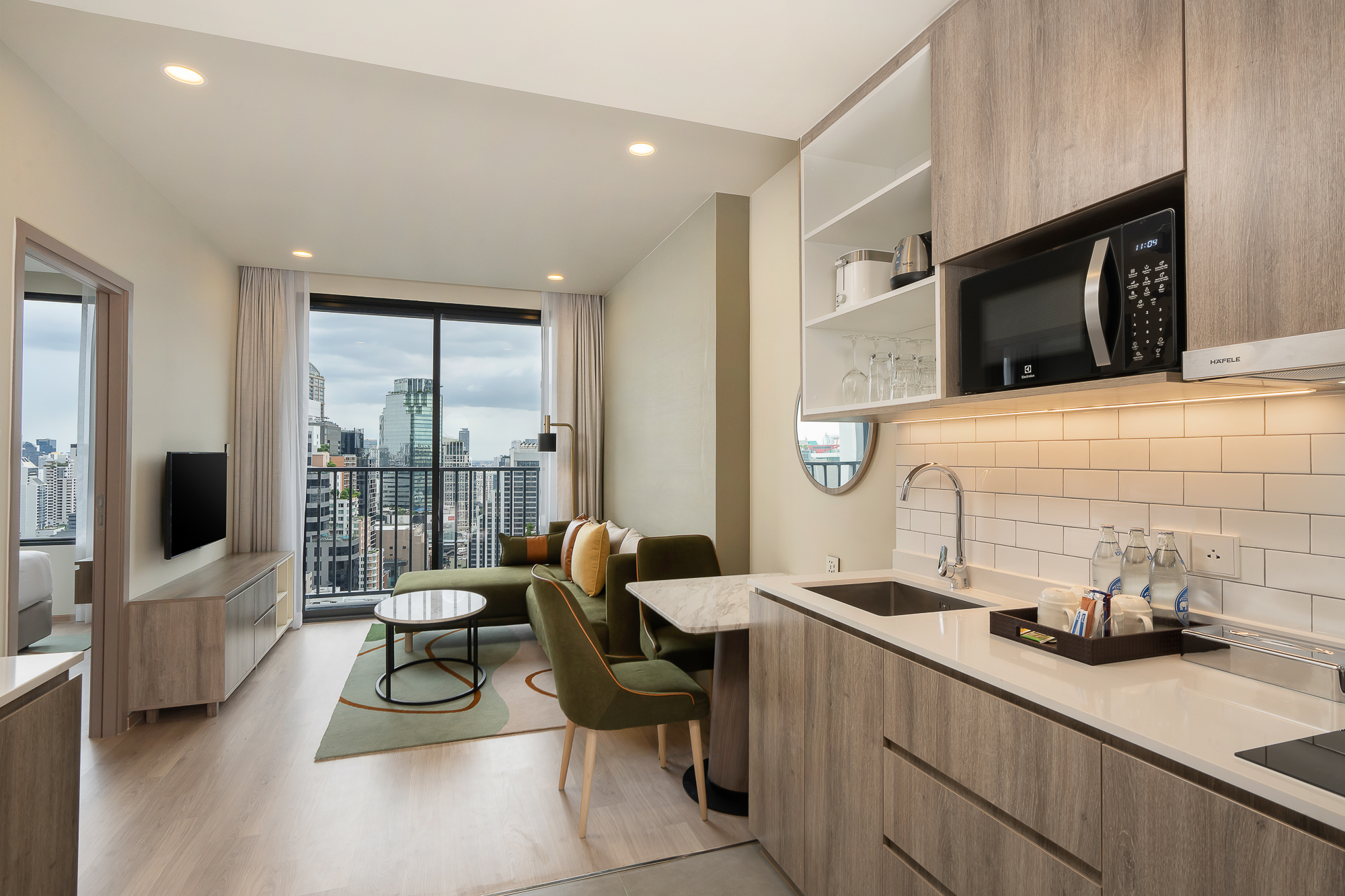 Living area of one-bedroom suite at Staybridge Suites Bangkok Sukhumvit