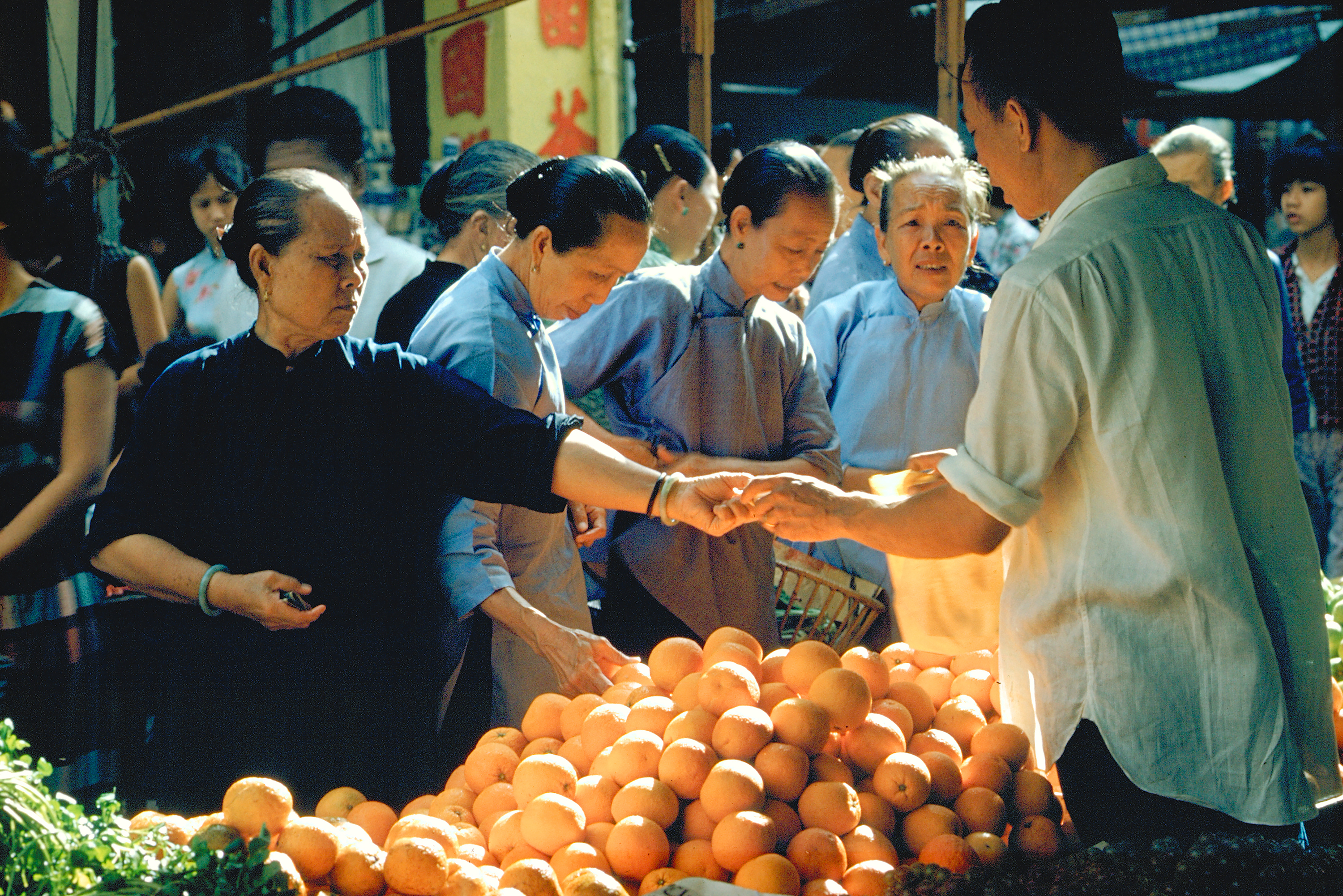 In A Singapore Market, 1962, Chinatown, Singapore, part of the Collection of the National Museum of Singapore