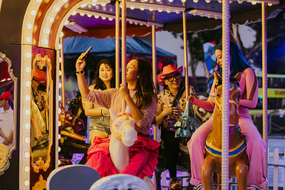 Festival-goers on the carousel at this year’s Highlight Act, Wonder World – The Machine of Nostalgia by Sam Lo “SKL0”
