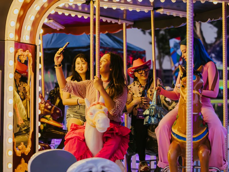 Festival-goers on the carousel at this year’s Highlight Act, Wonder World – The Machine of Nostalgia by Sam Lo “SKL0”
